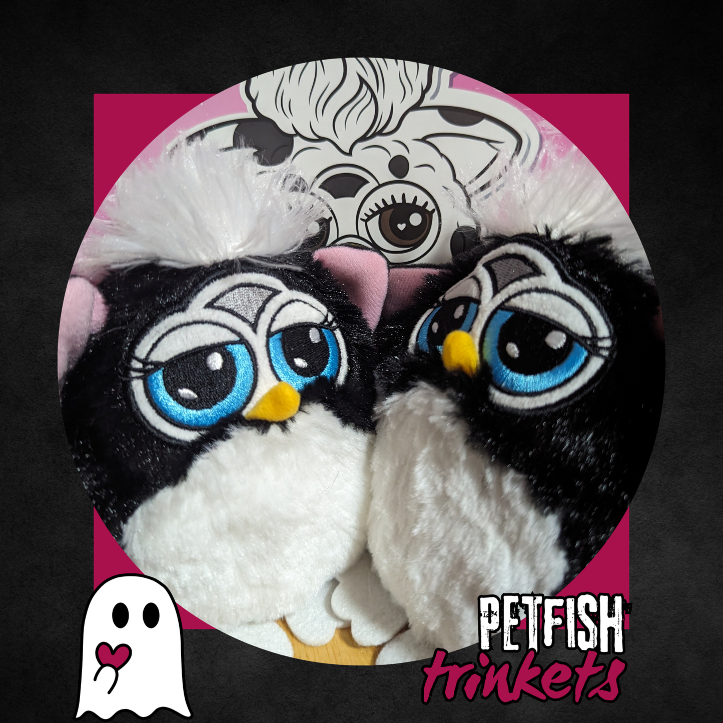 A trinket of furby sitting next to each other.