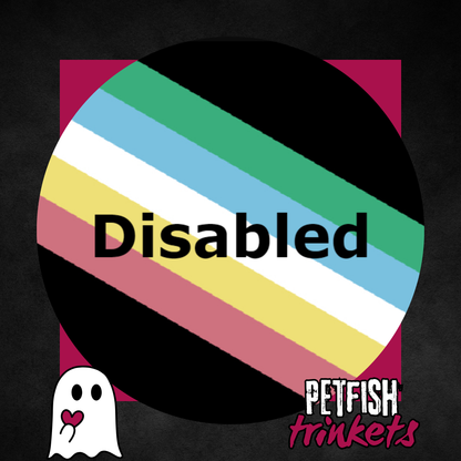 The Disability Pride Flag with the word Disabled